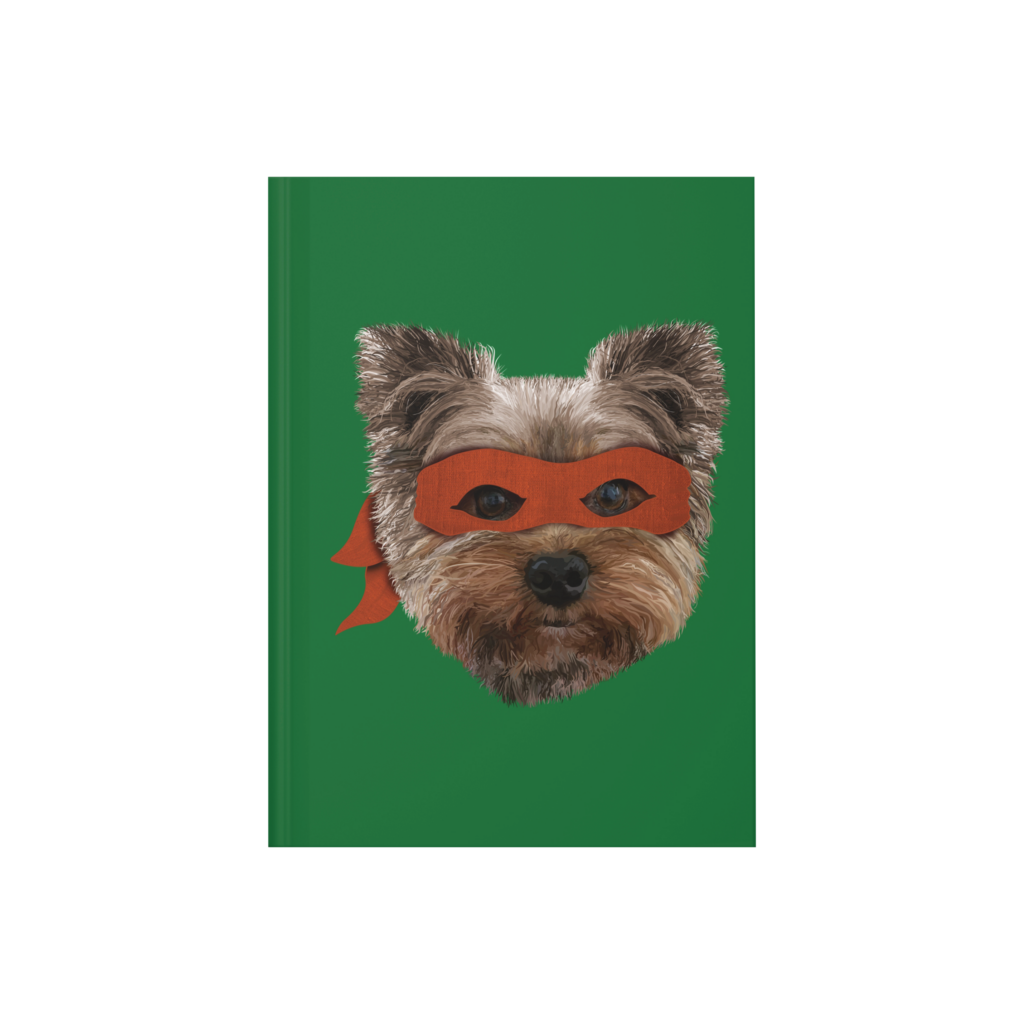 A green hardcover journal featuring our hand drawn image of our Yorkie BFF wearing an orange ninja mask.
