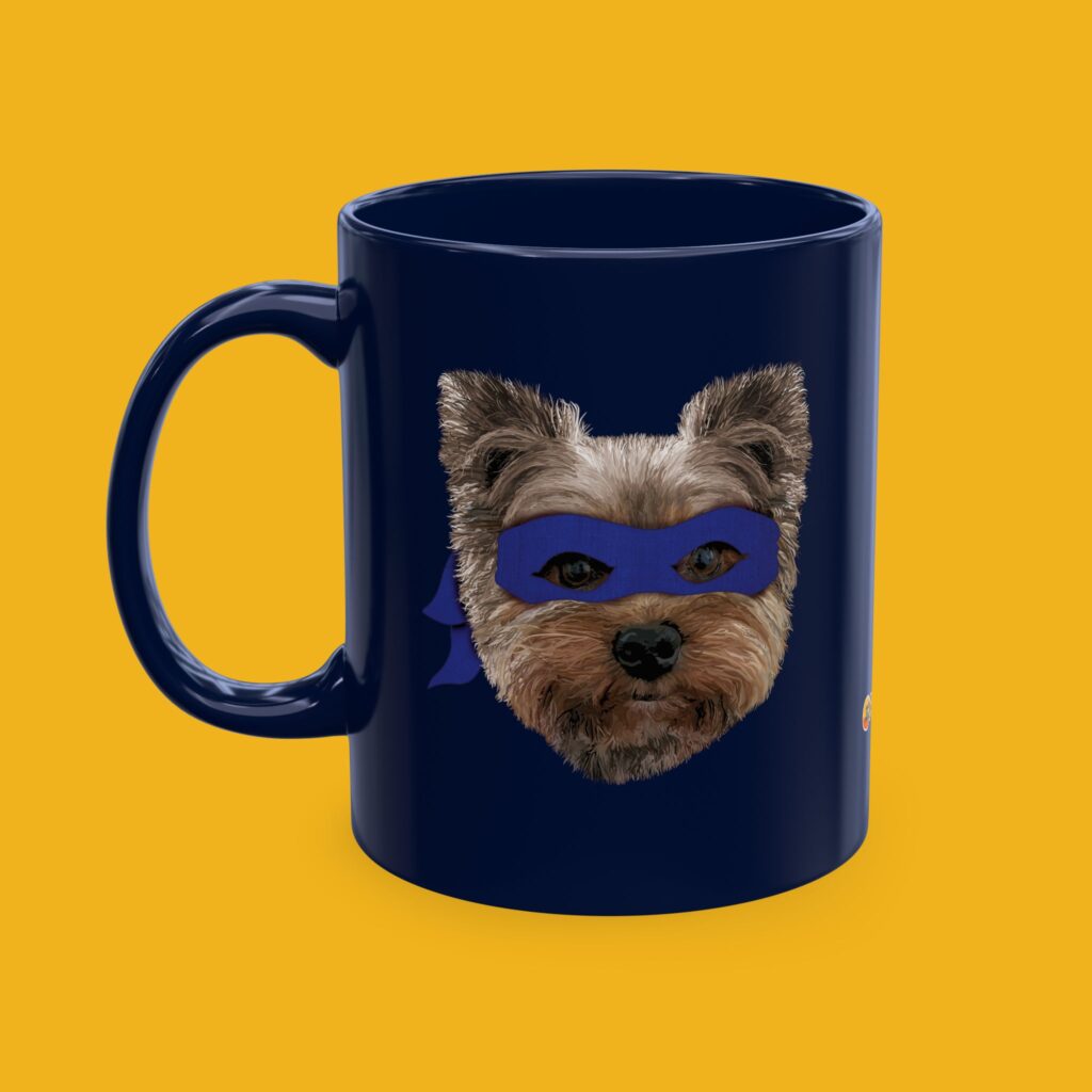 Blue coffee mug featuring a hand drawn image of our Yorkie BFF wearing a purple ninja mask.